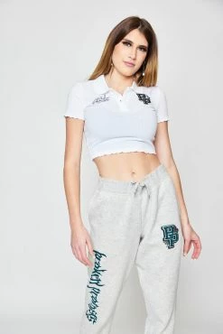 BROKEN PROMISES Poor Sport Cropped Polo Top Womens
