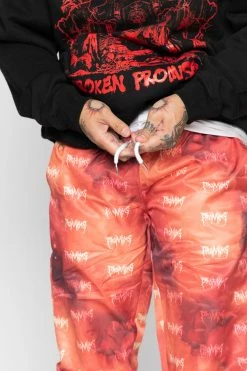 BROKEN PROMISES Bottoms BP Galactic Graveyard Pants Orange