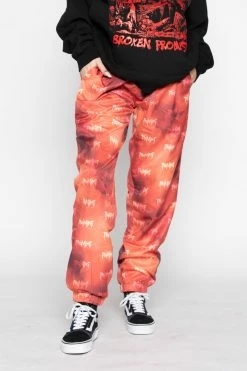 BROKEN PROMISES Bottoms BP Galactic Graveyard Pants Orange